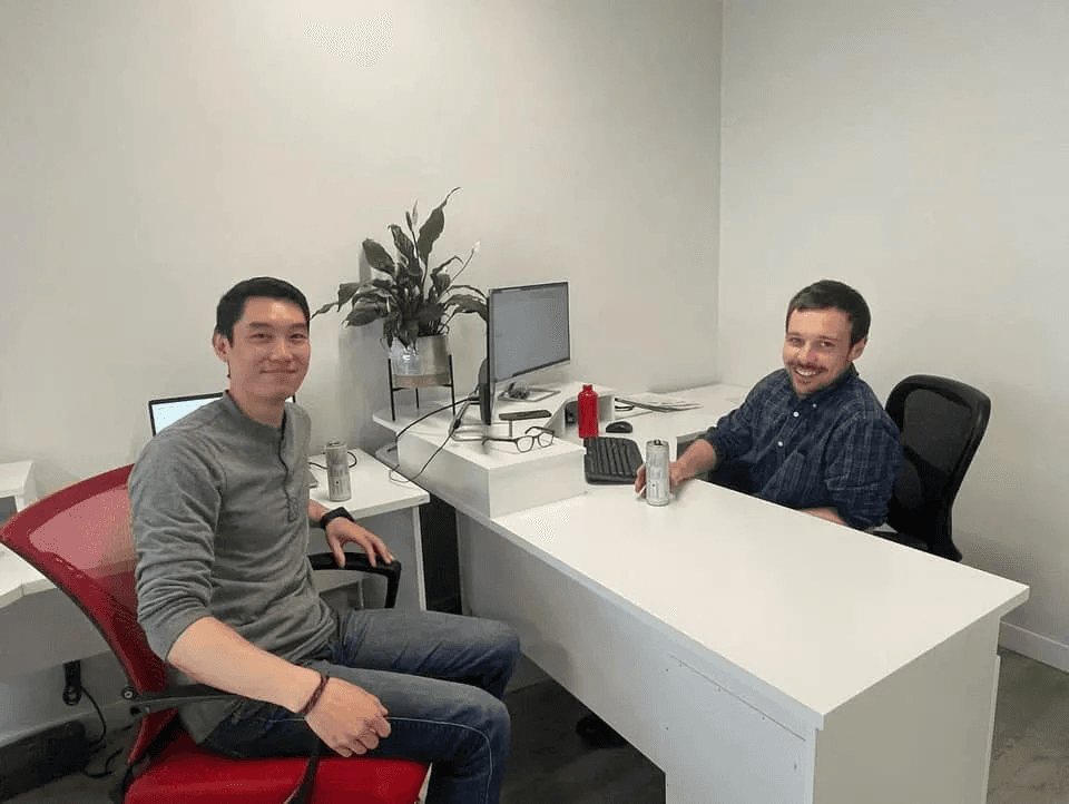 Two Avesta team members at their desks in the Squamish office