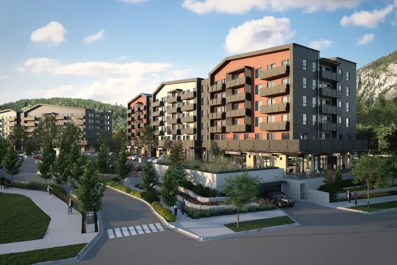A modern Squamish apartment complex with the Stawamus Chief in the background